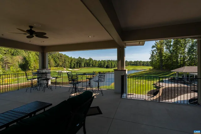 a car parked in front of white house