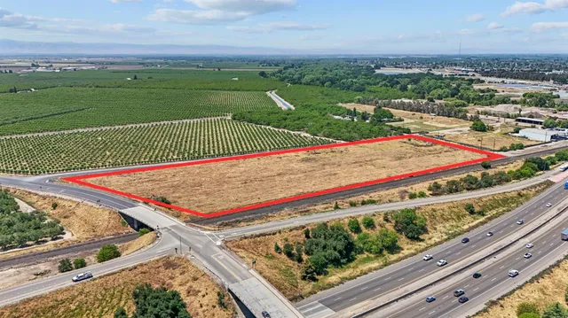 an aerial view of a red and white house