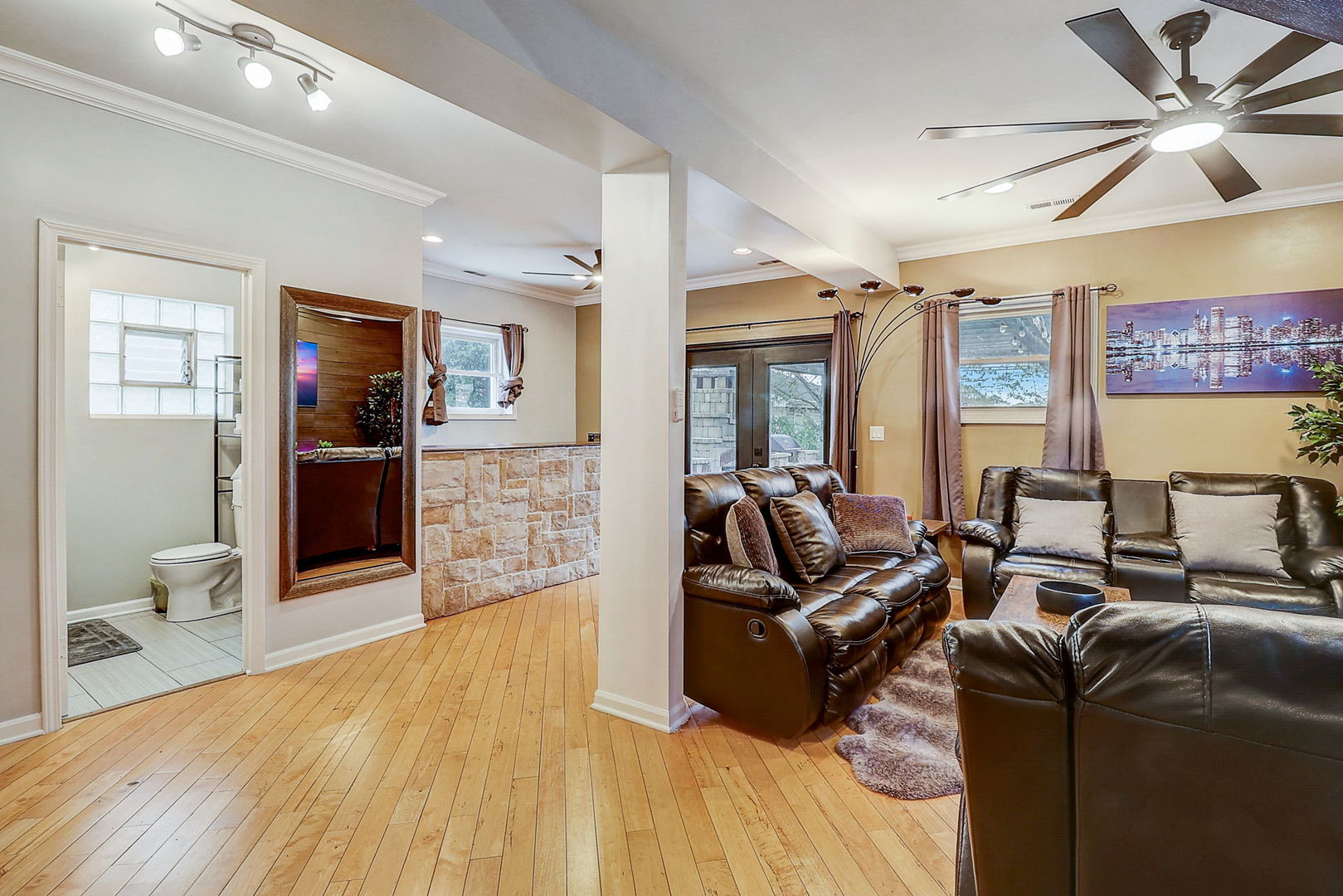 4045 Ruby Street Schiller Park, IL 60176 - Photo 12 of 33 a living room with furniture and a flat screen tv
