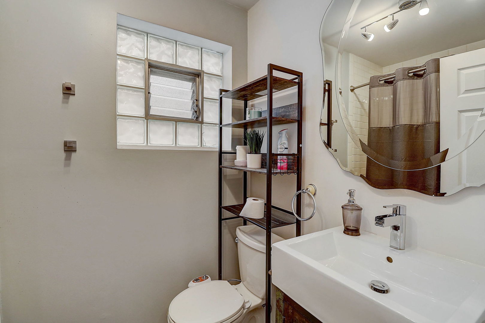 4045 Ruby Street Schiller Park, IL 60176 - Photo 14 of 33 a bathroom with a sink toilet and shower