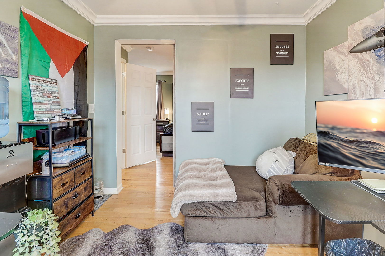 4045 Ruby Street Schiller Park, IL 60176 - Photo 19 of 33 a living room with furniture and a flat screen tv
