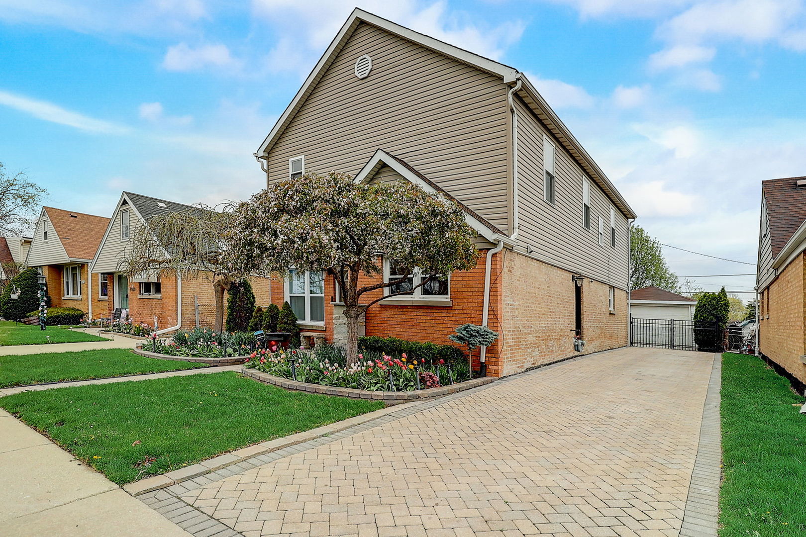4045 Ruby Street Schiller Park, IL 60176 - Photo 2 of 33 a view of a house with a yard