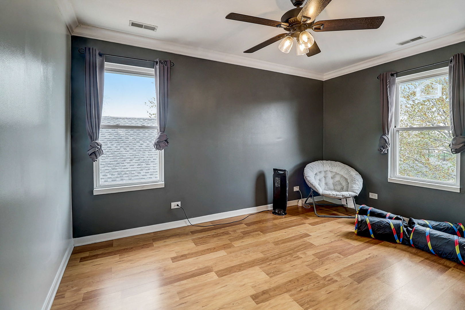 4045 Ruby Street Schiller Park, IL 60176 - Photo 23 of 33 a view of room with window and wooden floor