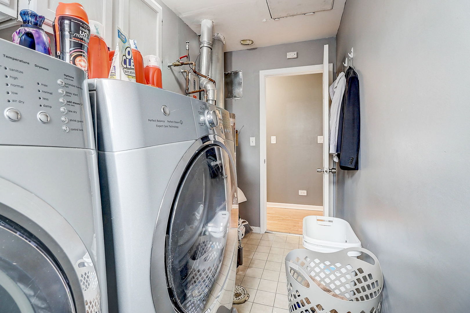4045 Ruby Street Schiller Park, IL 60176 - Photo 25 of 33 a view of a hallway with washer and dryer