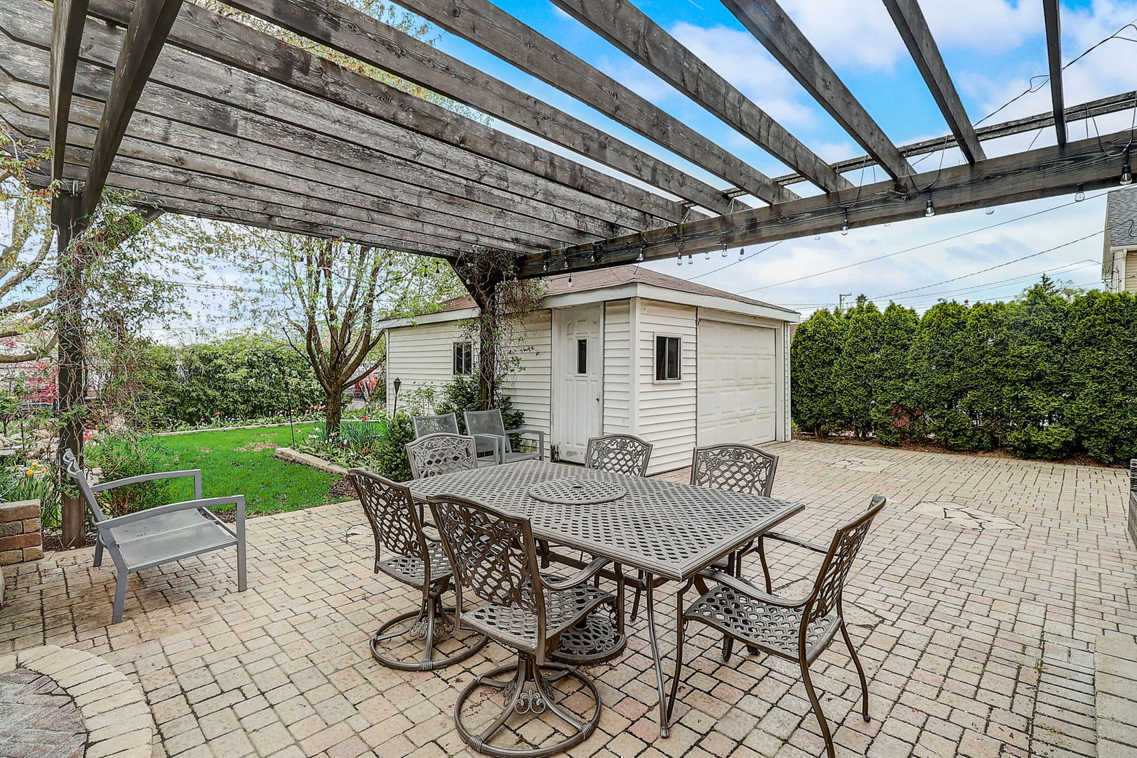 4045 Ruby Street Schiller Park, IL 60176 - Photo 26 of 33 a view of patio with table and chairs and potted plants