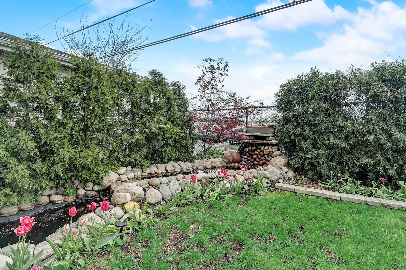 4045 Ruby Street Schiller Park, IL 60176 - Photo 30 of 33 a view of a garden with flowers