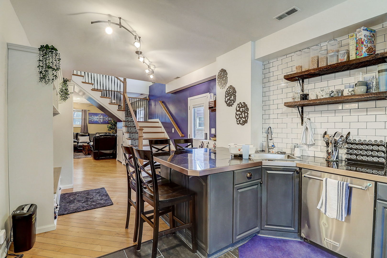 4045 Ruby Street Schiller Park, IL 60176 - Photo 6 of 33 a kitchen with lots of counter and chairs