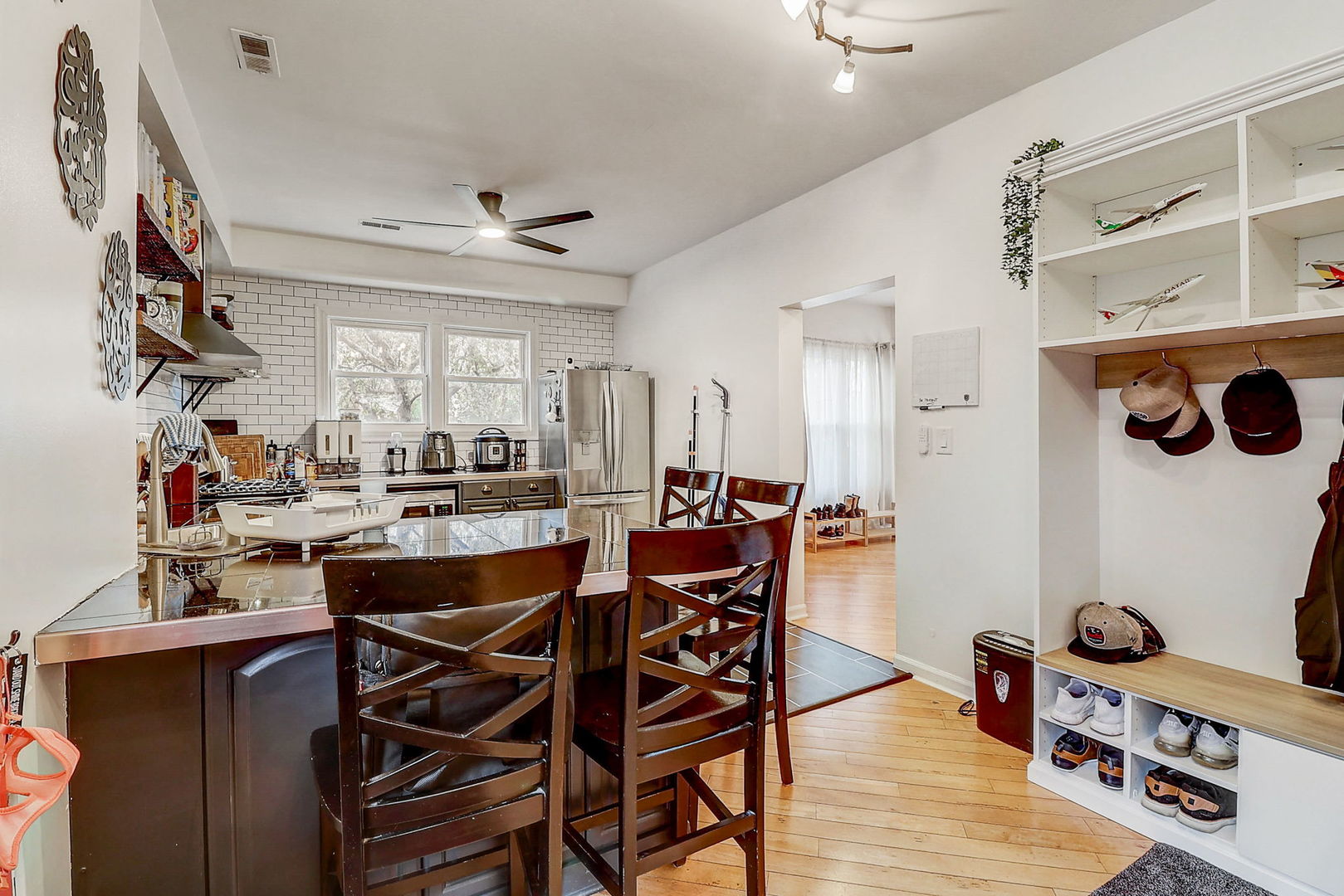 4045 Ruby Street Schiller Park, IL 60176 - Photo 8 of 33 a view of a dining room with furniture and a kitchen