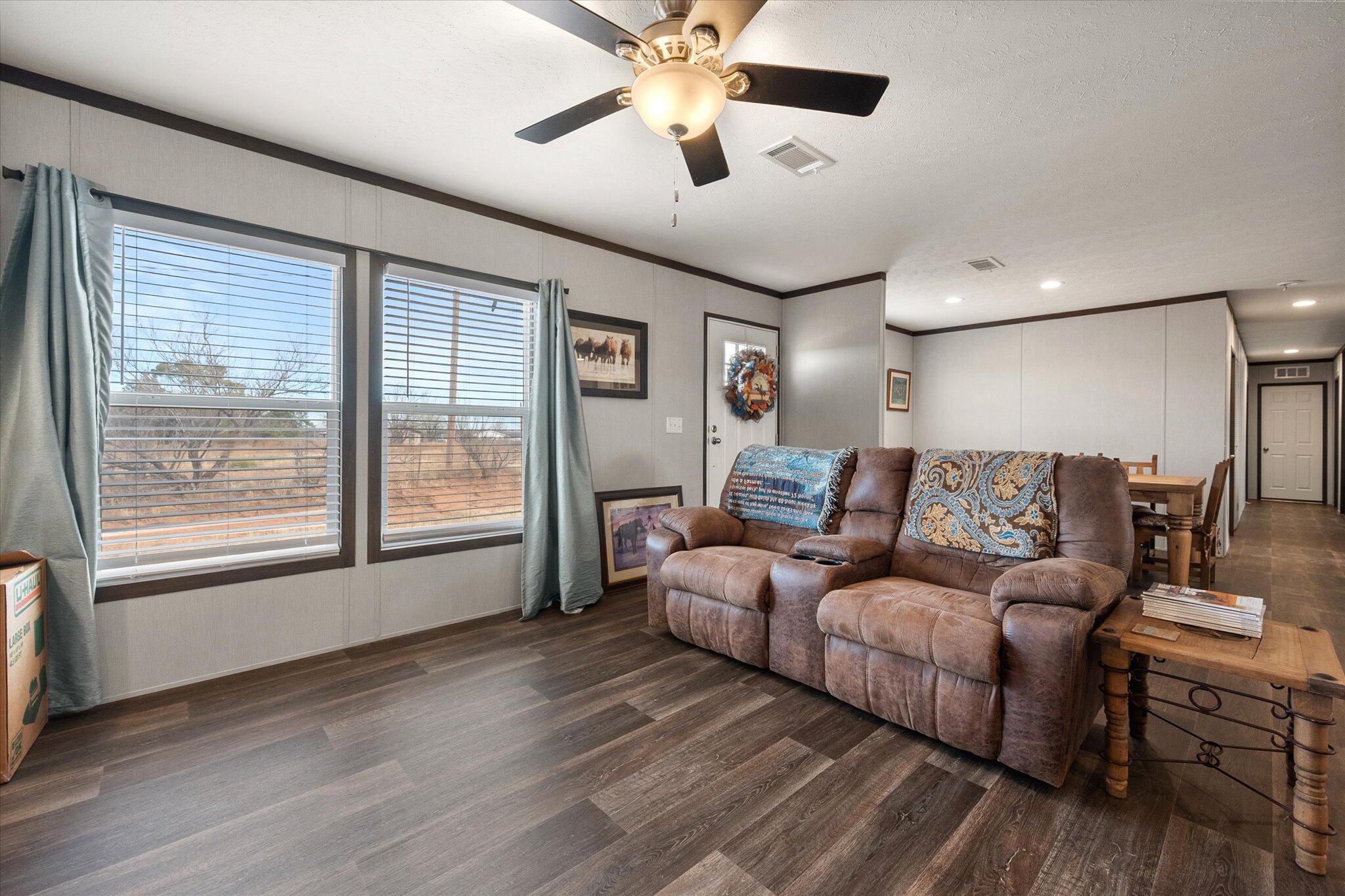 3013 West 15th Street Post, TX 79356 - Photo 43 of 71 a living room with furniture and a large window