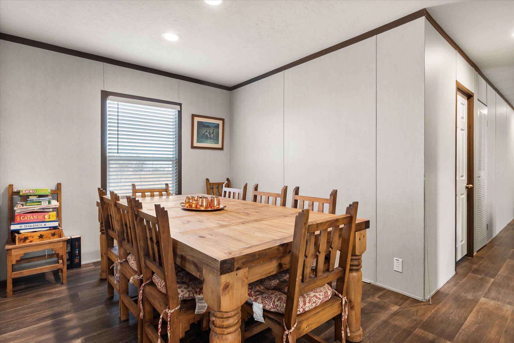 3013 West 15th Street Post, TX 79356 - Photo 51 of 71 a view of a dining room with furniture and wooden floor