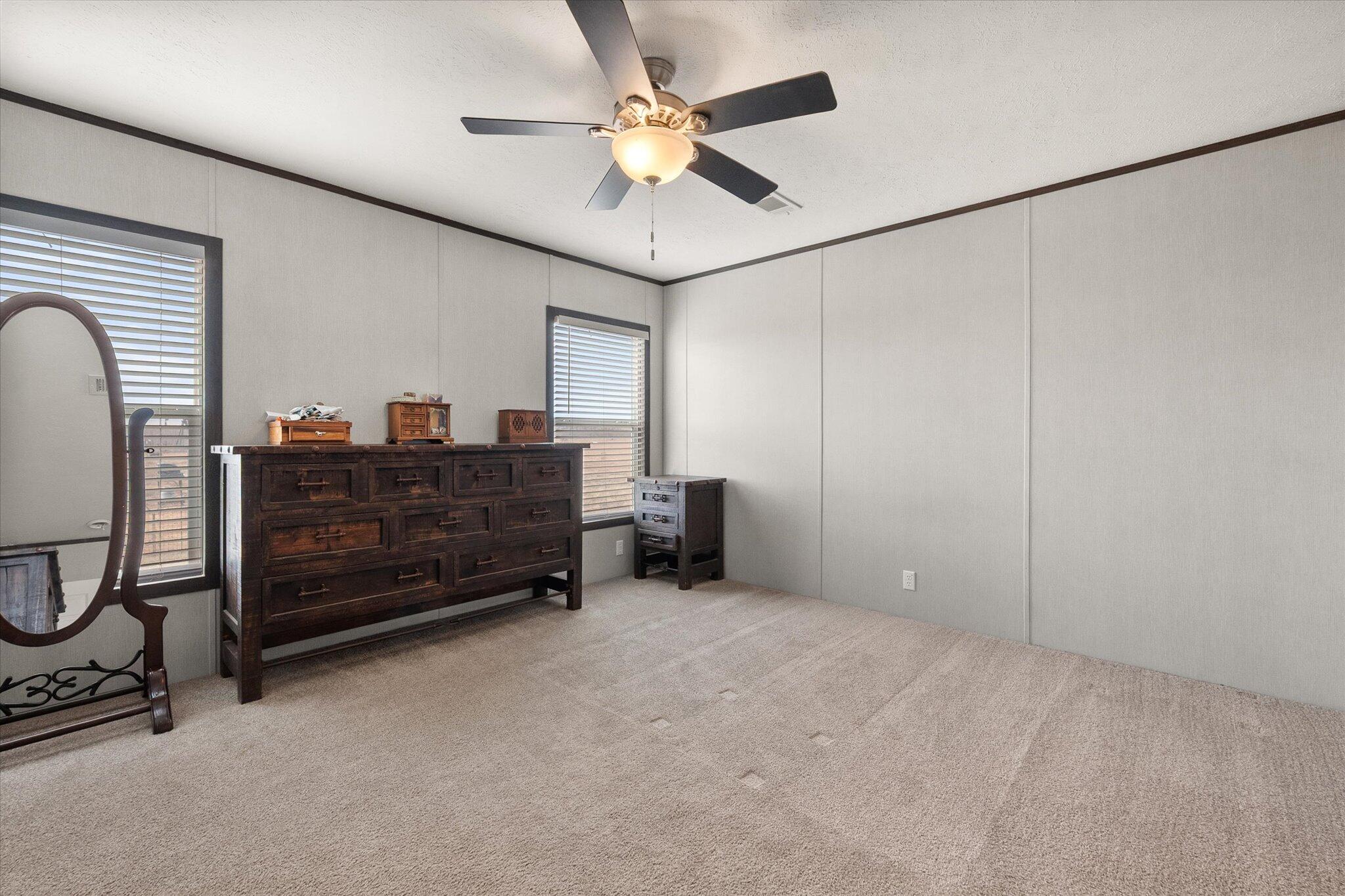 3013 West 15th Street Post, TX 79356 - Photo 54 of 71 a room with a dresser and gym equipment