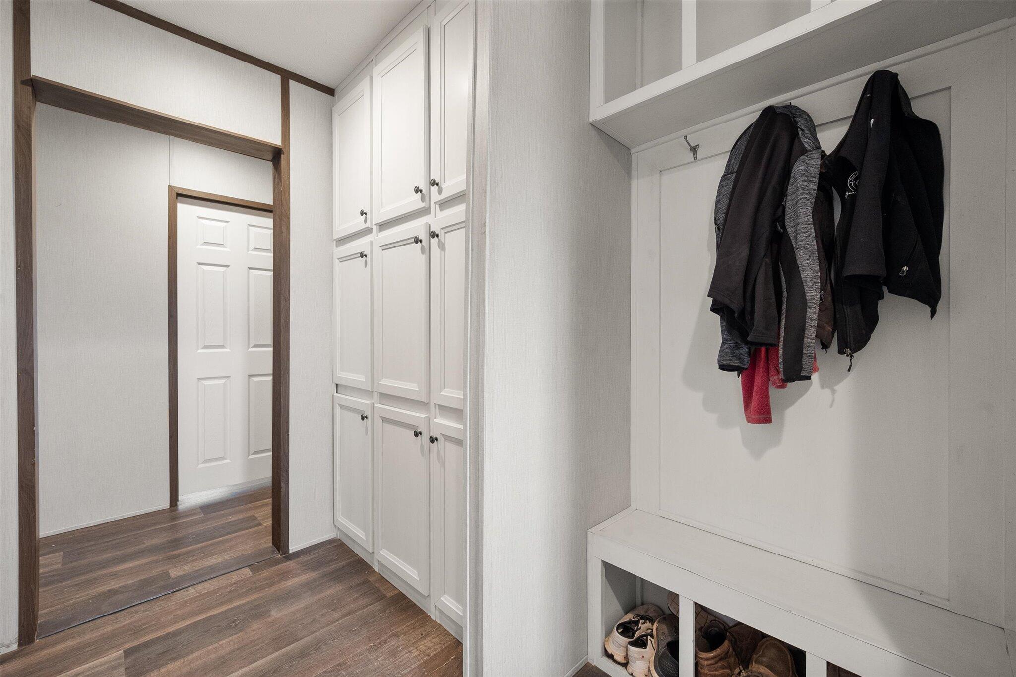 3013 West 15th Street Post, TX 79356 - Photo 67 of 71 a view of walk in closet with clothes and shoes