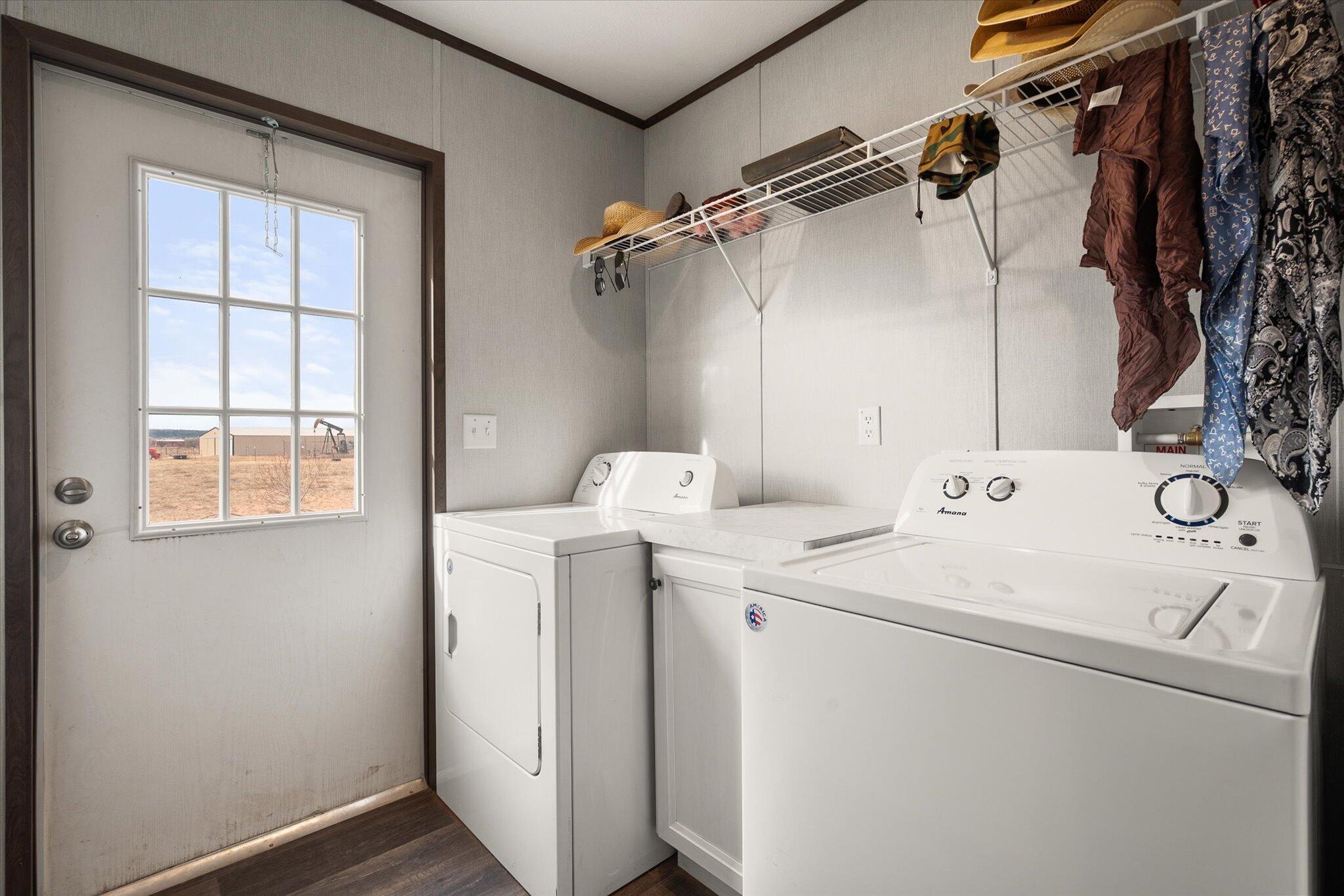 3013 West 15th Street Post, TX 79356 - Photo 68 of 71 a utility room with dryer and washer