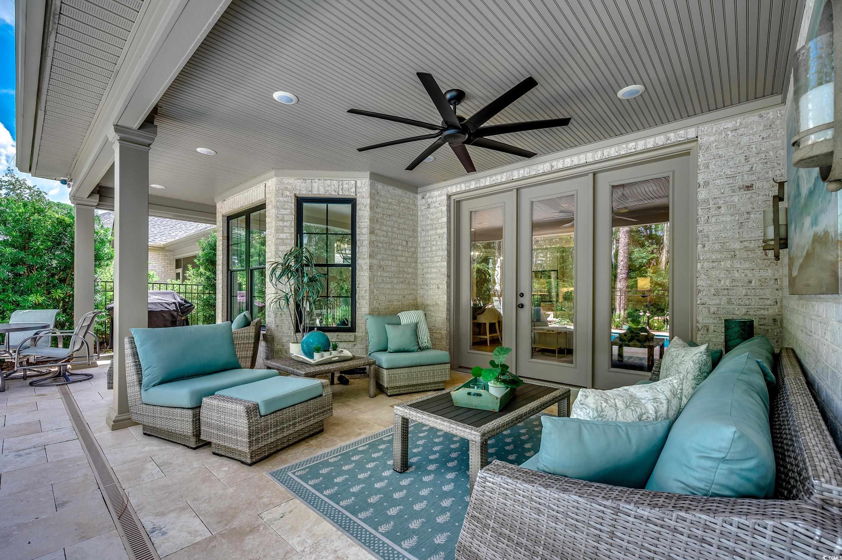 8404 Cape Dutch Loop Myrtle Beach, SC 29572 - Photo 28 of 40 View of patio / terrace with french doors, an outdoor hangout area, and a ceiling fan