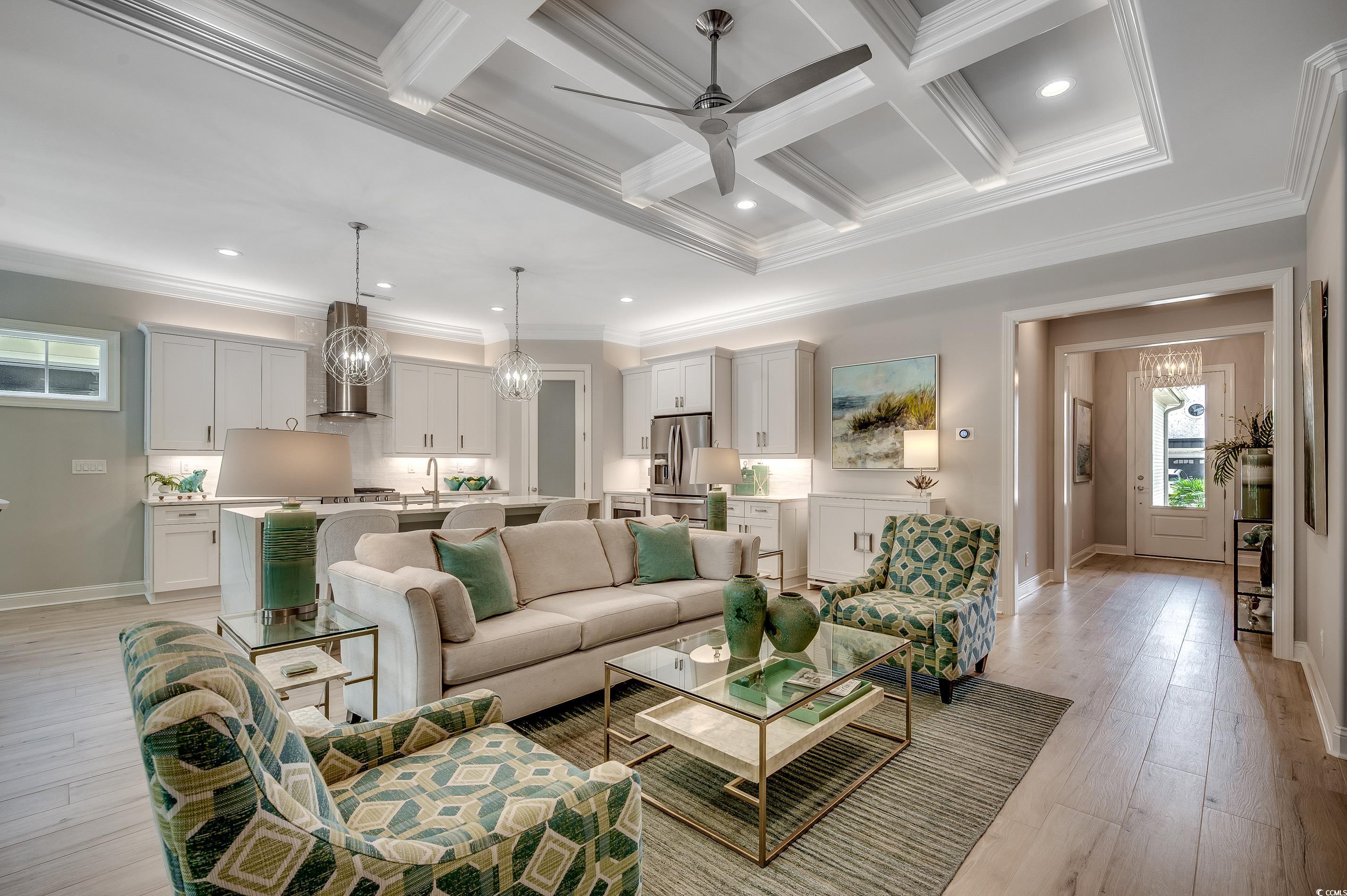 8404 Cape Dutch Loop Myrtle Beach, SC 29572 - Photo 7 of 40 Living room featuring a chandelier, coffered ceiling, beam ceiling, recessed lighting, and crown molding