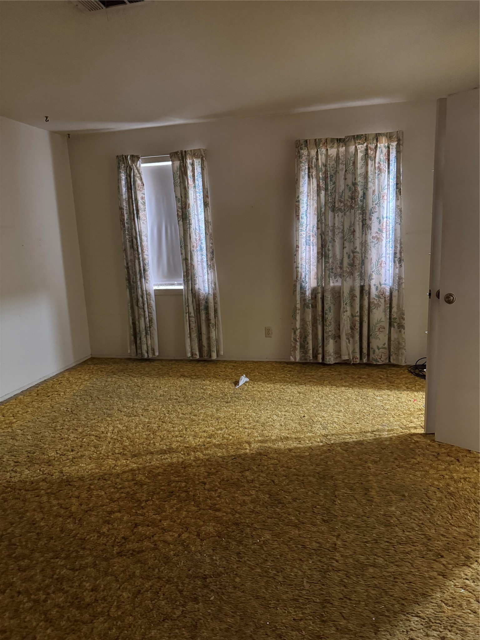 7815 Grove Ridge Drive Houston, TX 77061 - Photo 14 of 28 an empty room with windows