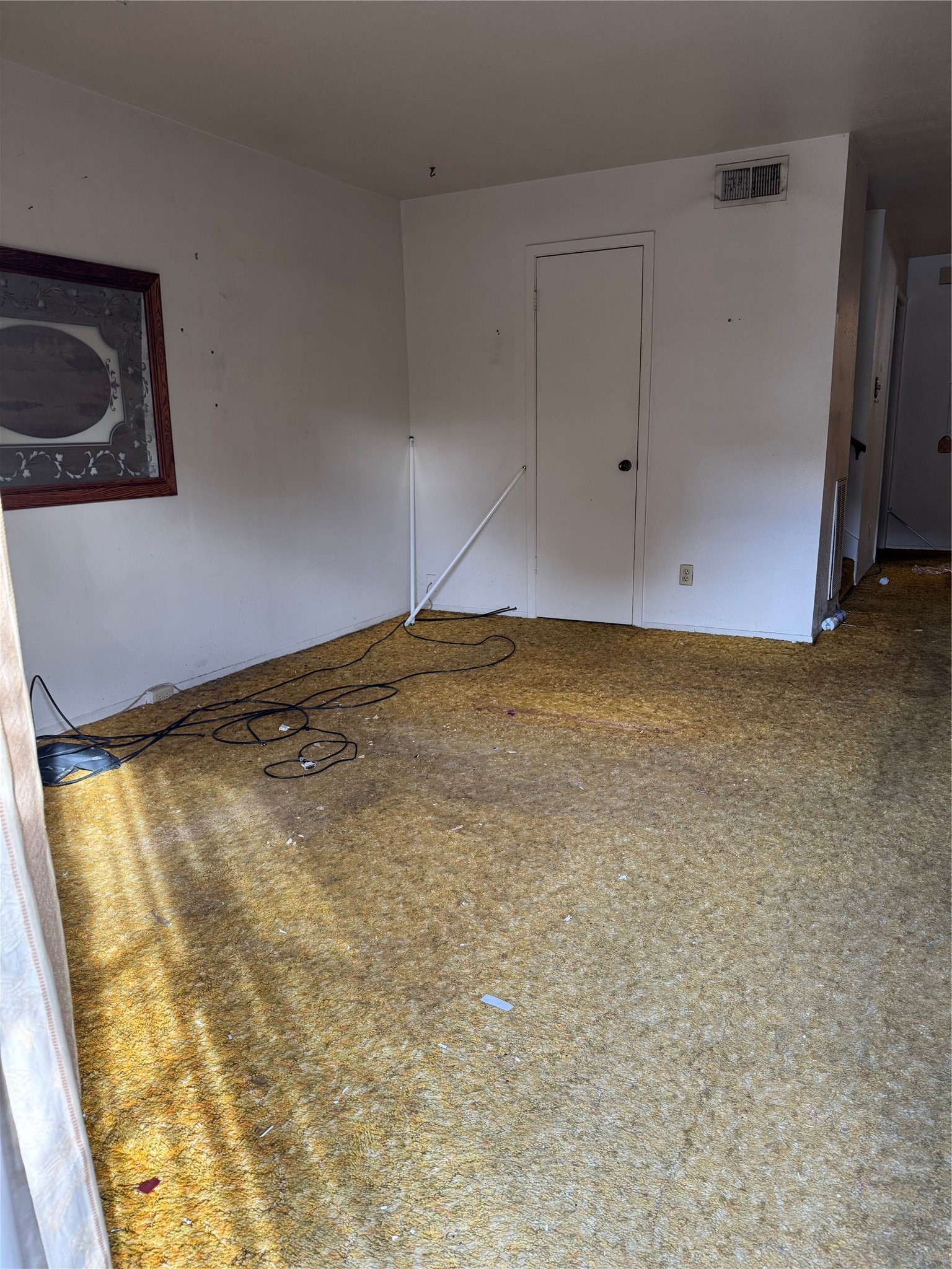 7815 Grove Ridge Drive Houston, TX 77061 - Photo 18 of 28 a view of empty room with wooden floor and fan