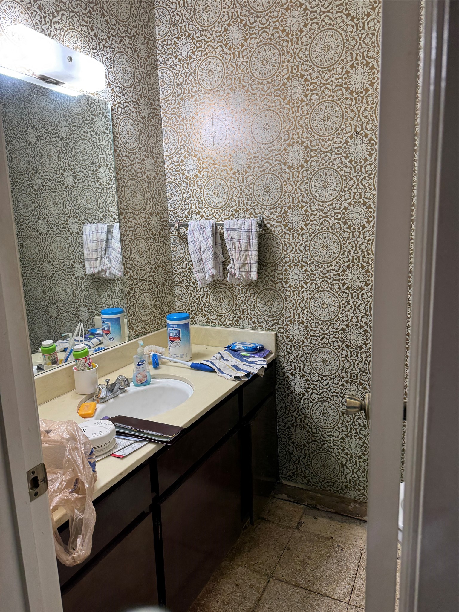 7815 Grove Ridge Drive Houston, TX 77061 - Photo 25 of 28 a bathroom with a sink mirror and vanity