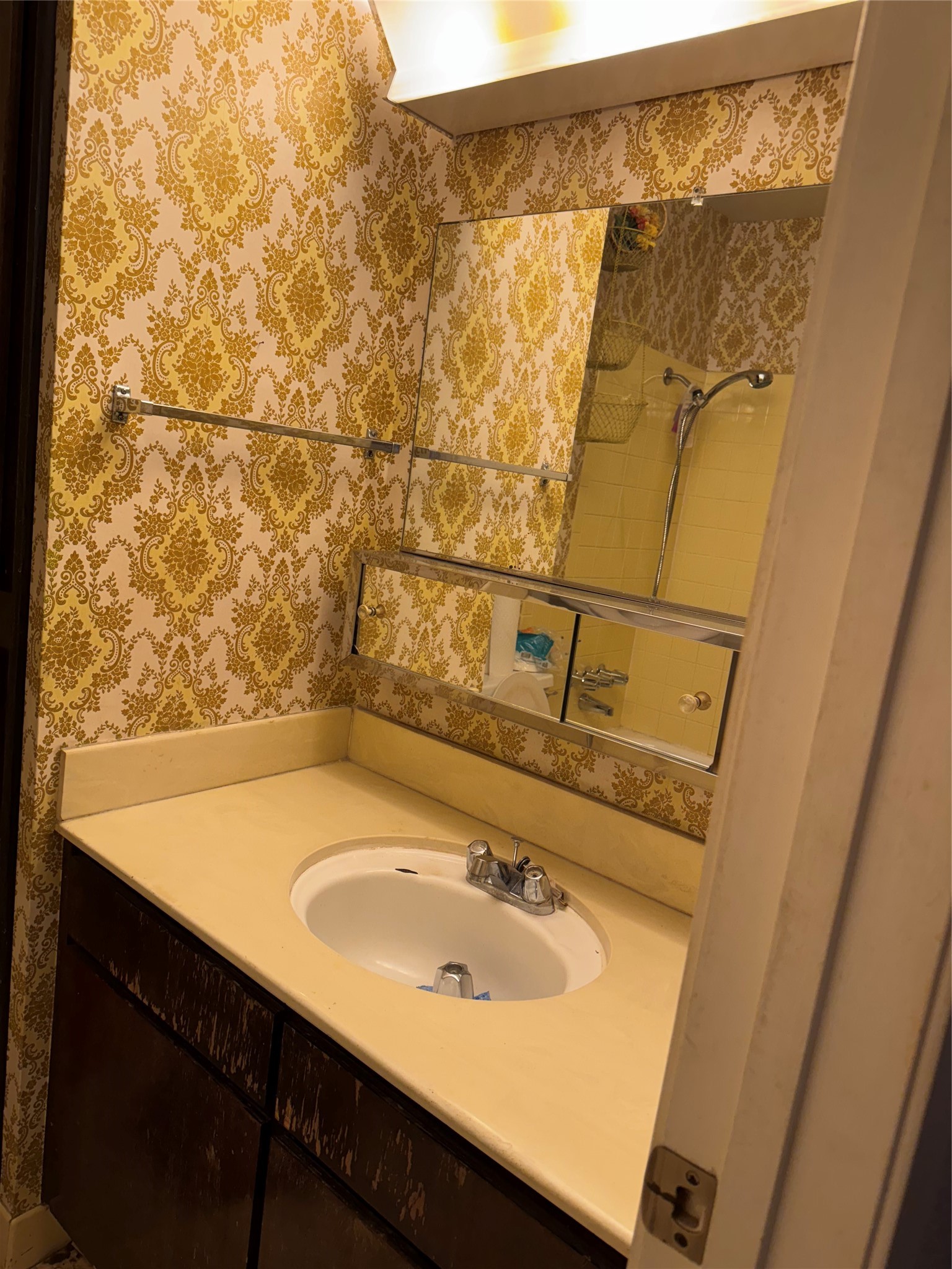 7815 Grove Ridge Drive Houston, TX 77061 - Photo 7 of 28 a bathroom with a sink and a mirror