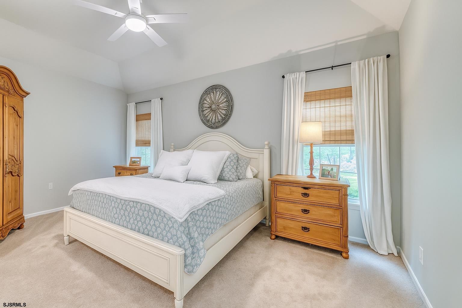 243 Lily Road Egg Harbor Township, NJ 08234 - Photo 13 of 29 a bedroom with a bed and a window