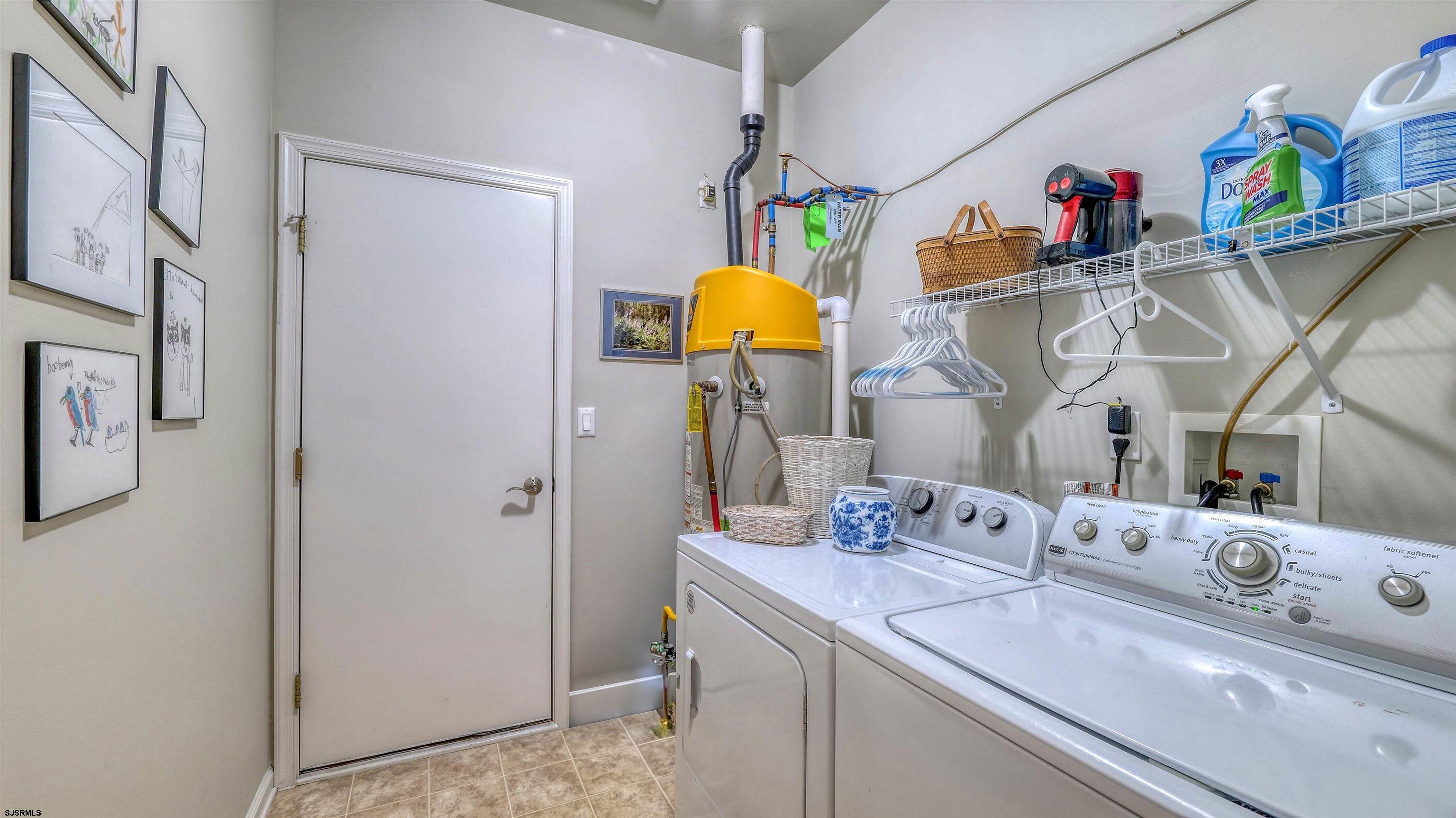 243 Lily Road Egg Harbor Township, NJ 08234 - Photo 20 of 29 a bathroom with a sink mirror and vanity
