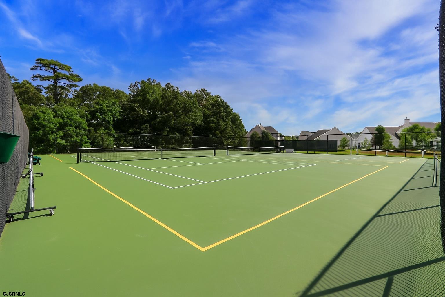 243 Lily Road Egg Harbor Township, NJ 08234 - Photo 25 of 29 a view of a tennis court