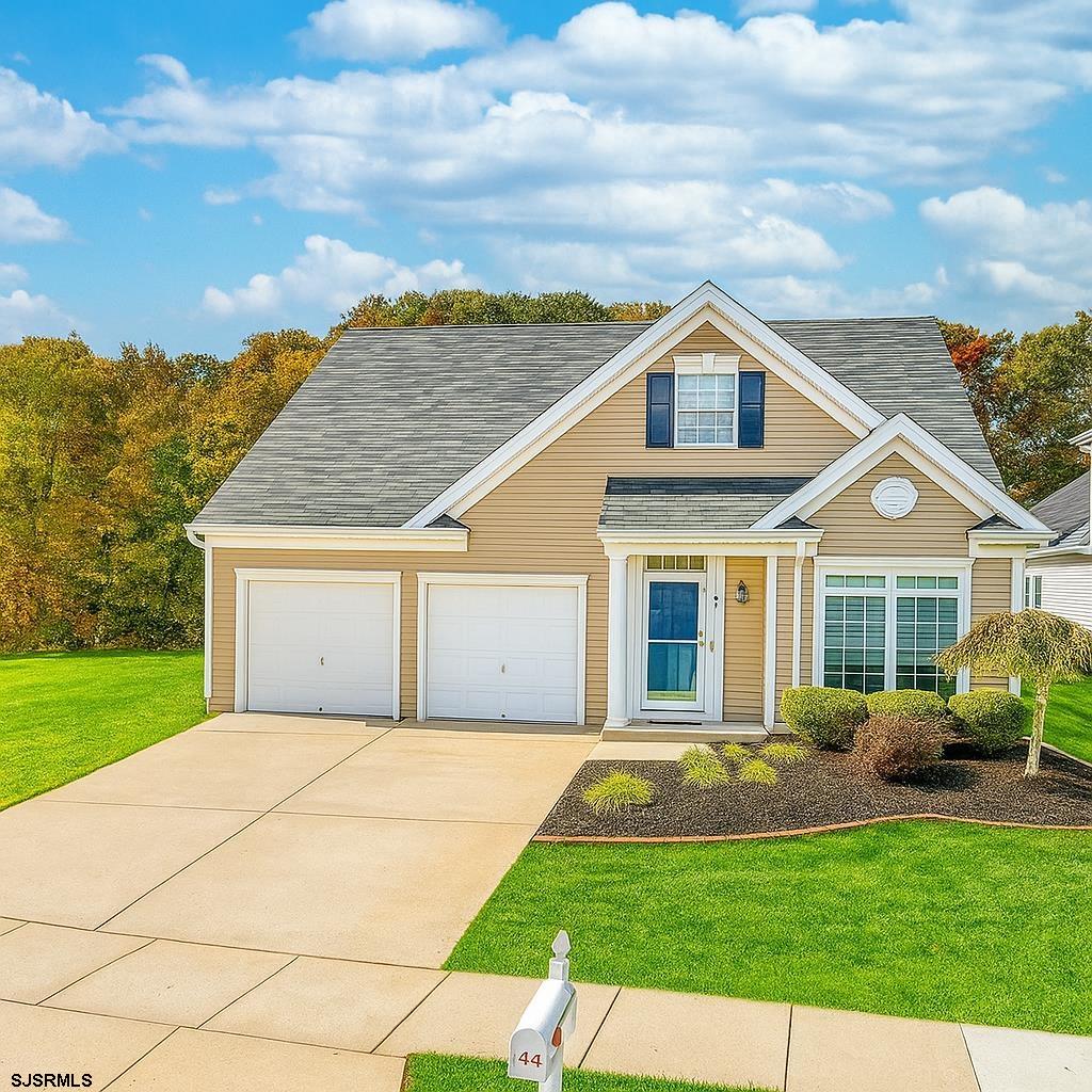 243 Lily Road Egg Harbor Township, NJ 08234 - Photo 29 of 29 a front view of a house with a yard