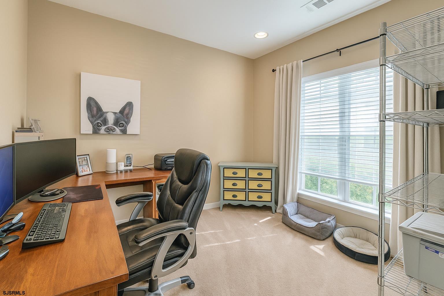 243 Lily Road Egg Harbor Township, NJ 08234 - Photo 5 of 29 a view of a workspace with furniture and a window