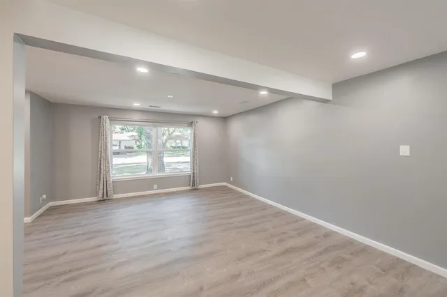 a view of backyard with large trees