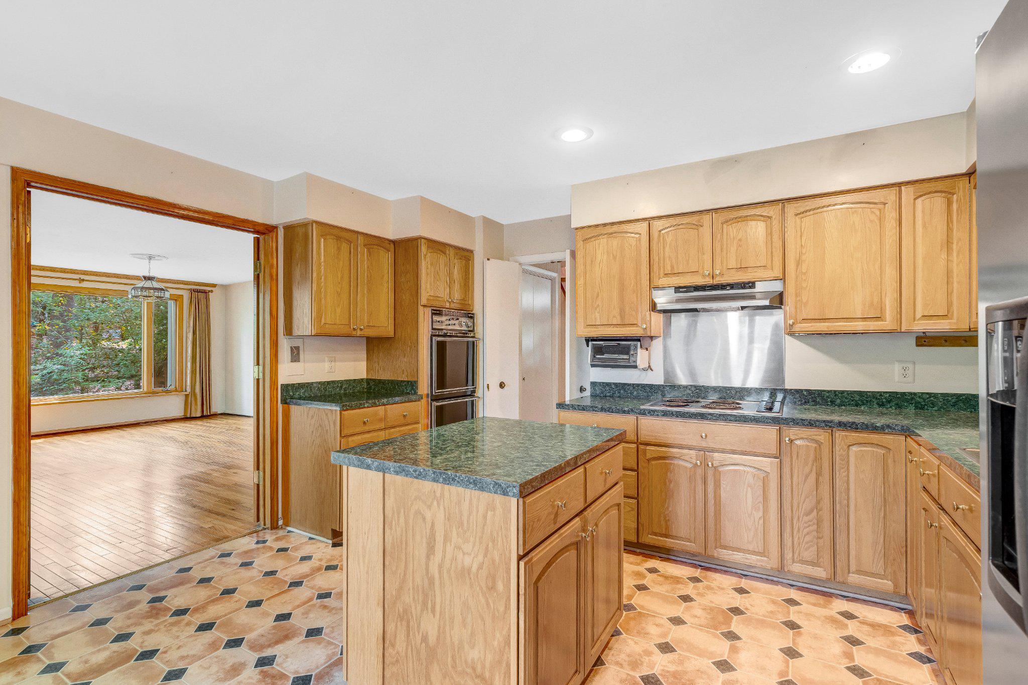 10910 Miller Road Oakton, VA 22124 - Photo 12 of 58 Spacious kitchen with elegant finishes.