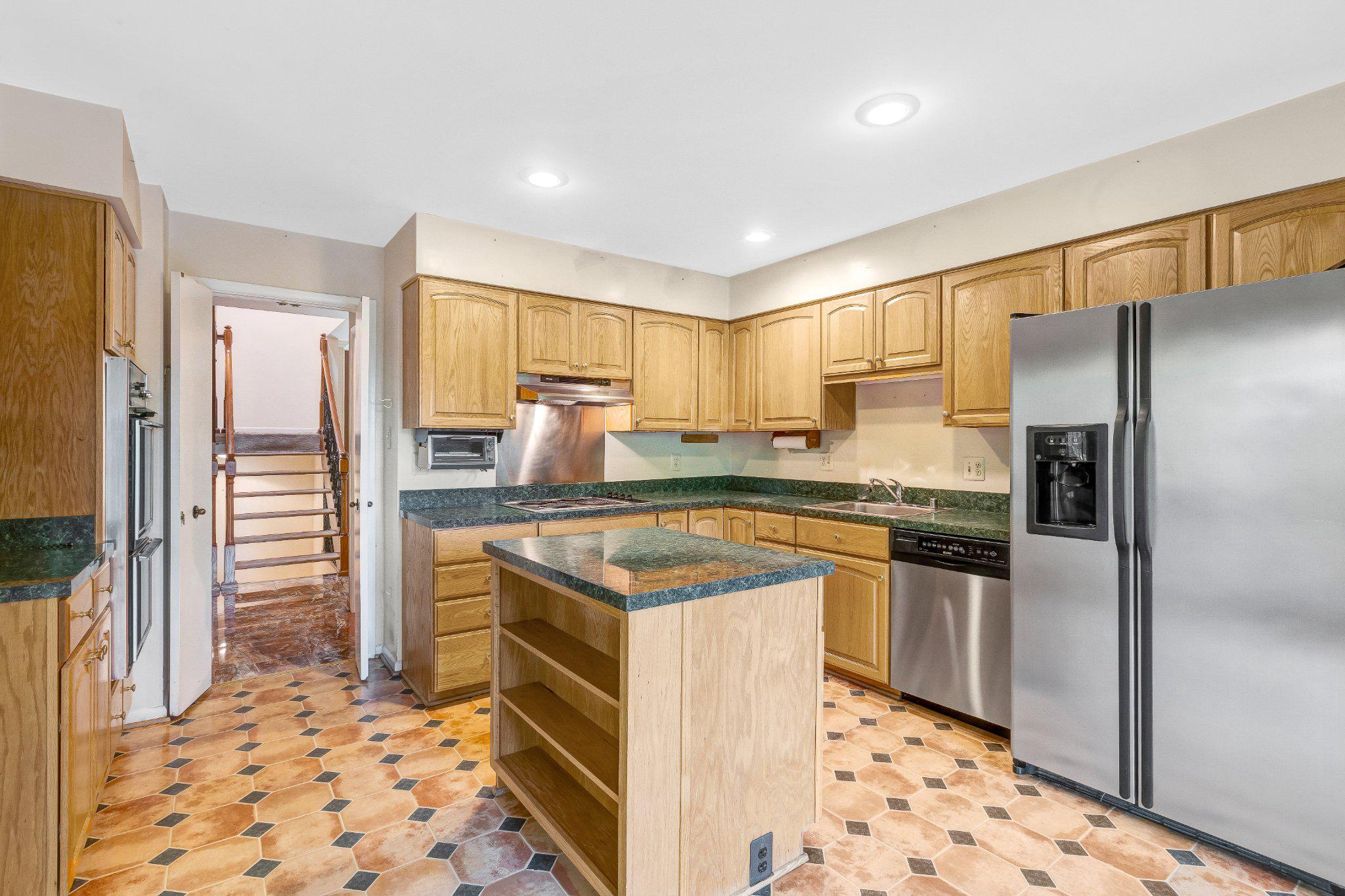 10910 Miller Road Oakton, VA 22124 - Photo 13 of 58 Spacious kitchen with elegant finishes.