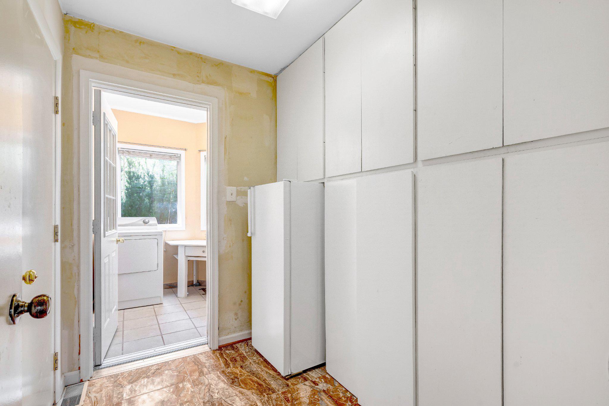 10910 Miller Road Oakton, VA 22124 - Photo 19 of 58 Bright and functional laundry entryway.
