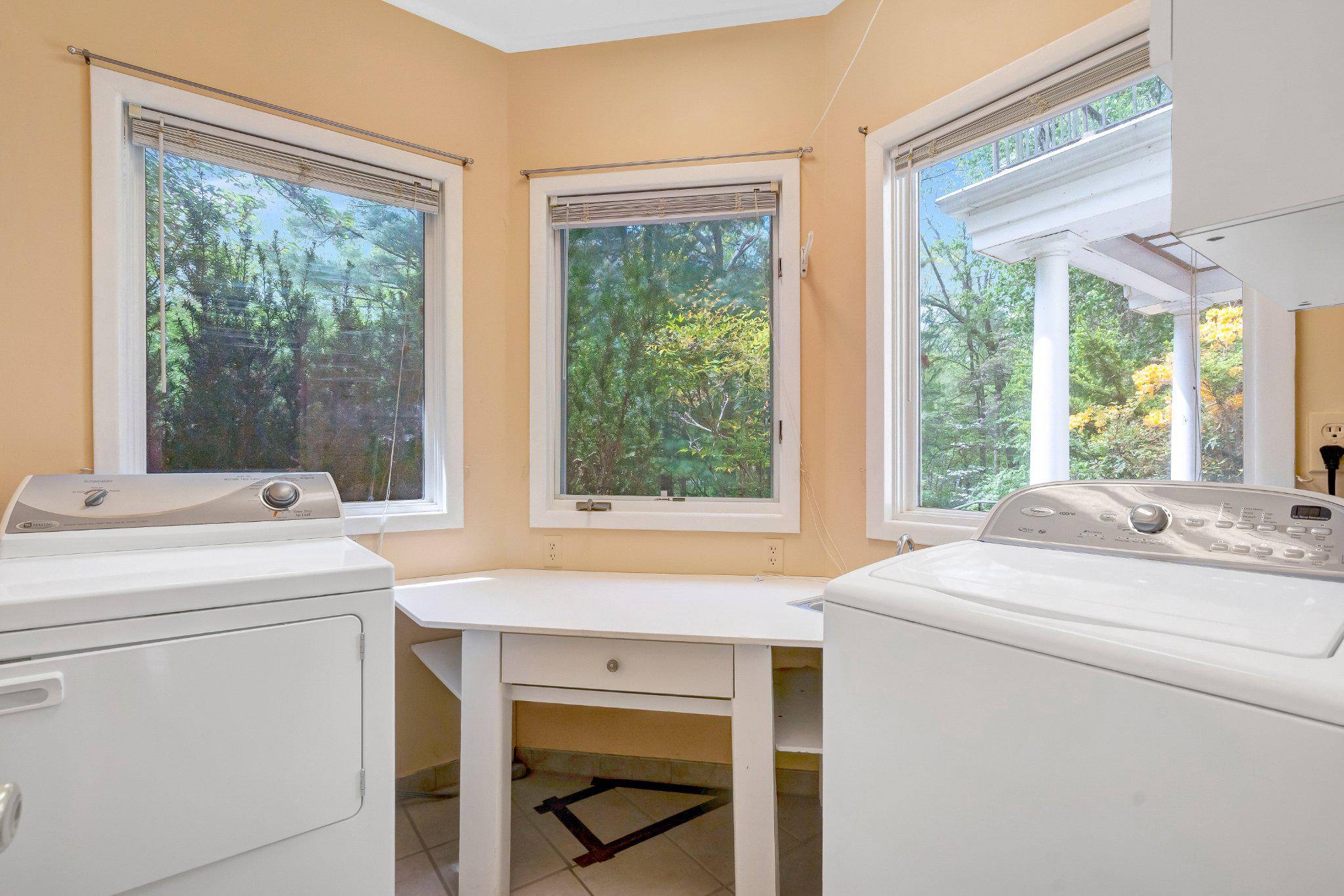 10910 Miller Road Oakton, VA 22124 - Photo 20 of 58 Bright laundry nook with nature views.