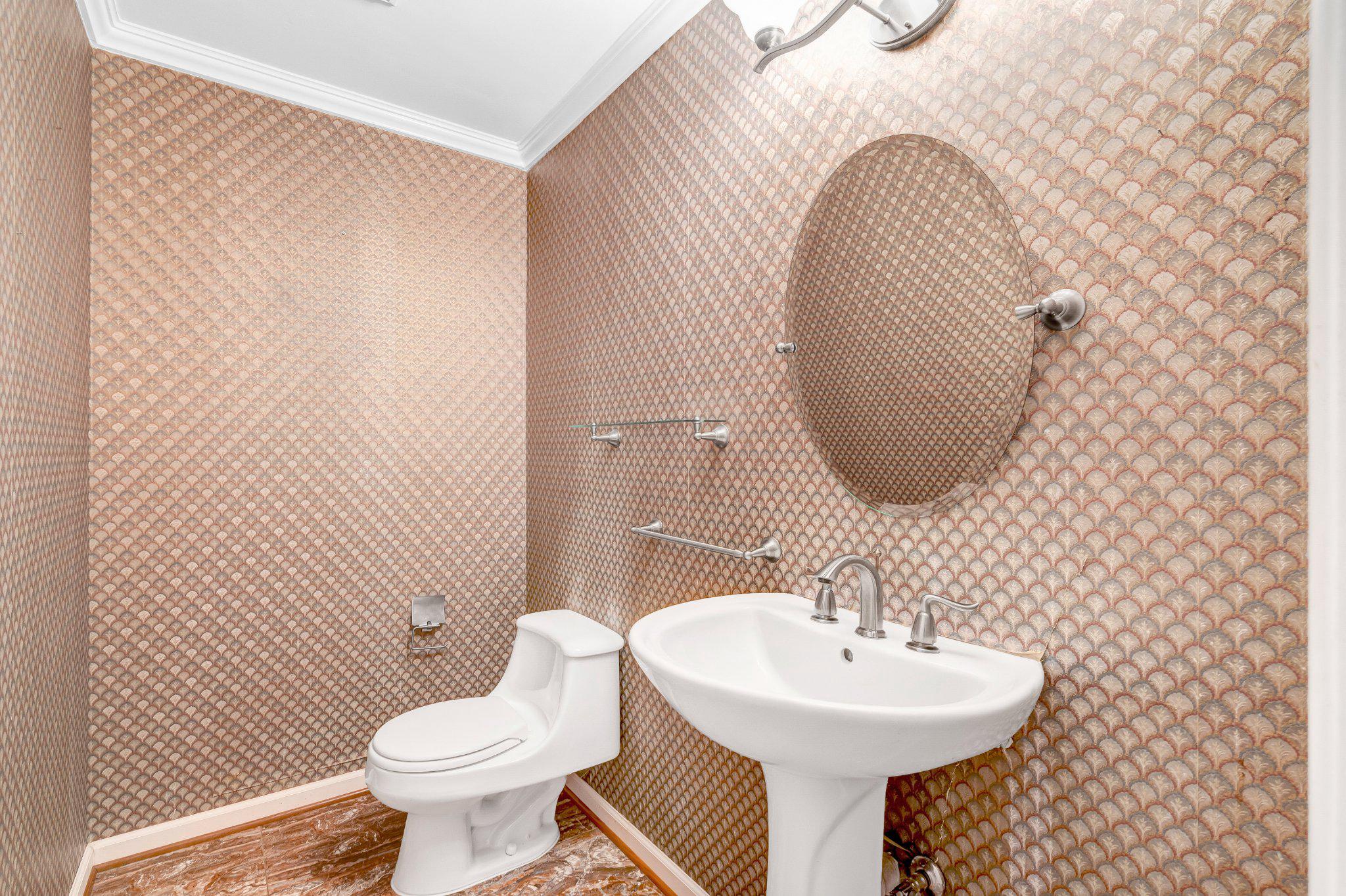 10910 Miller Road Oakton, VA 22124 - Photo 21 of 58 Elegant half-bath with textured walls.