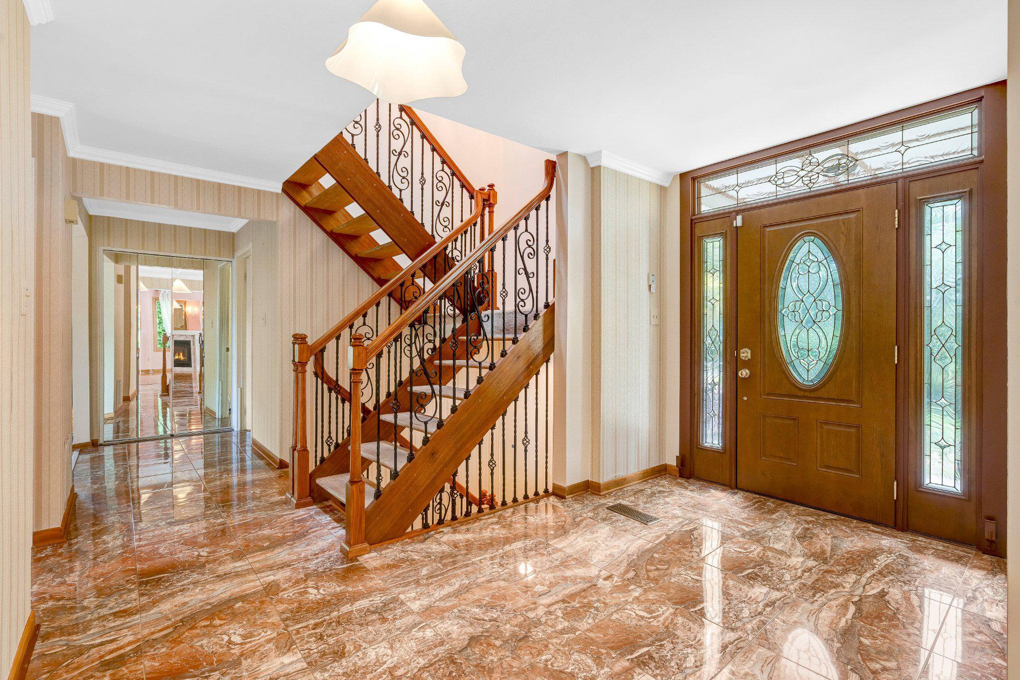 10910 Miller Road Oakton, VA 22124 - Photo 22 of 58 Elegant foyer with stunning staircase.