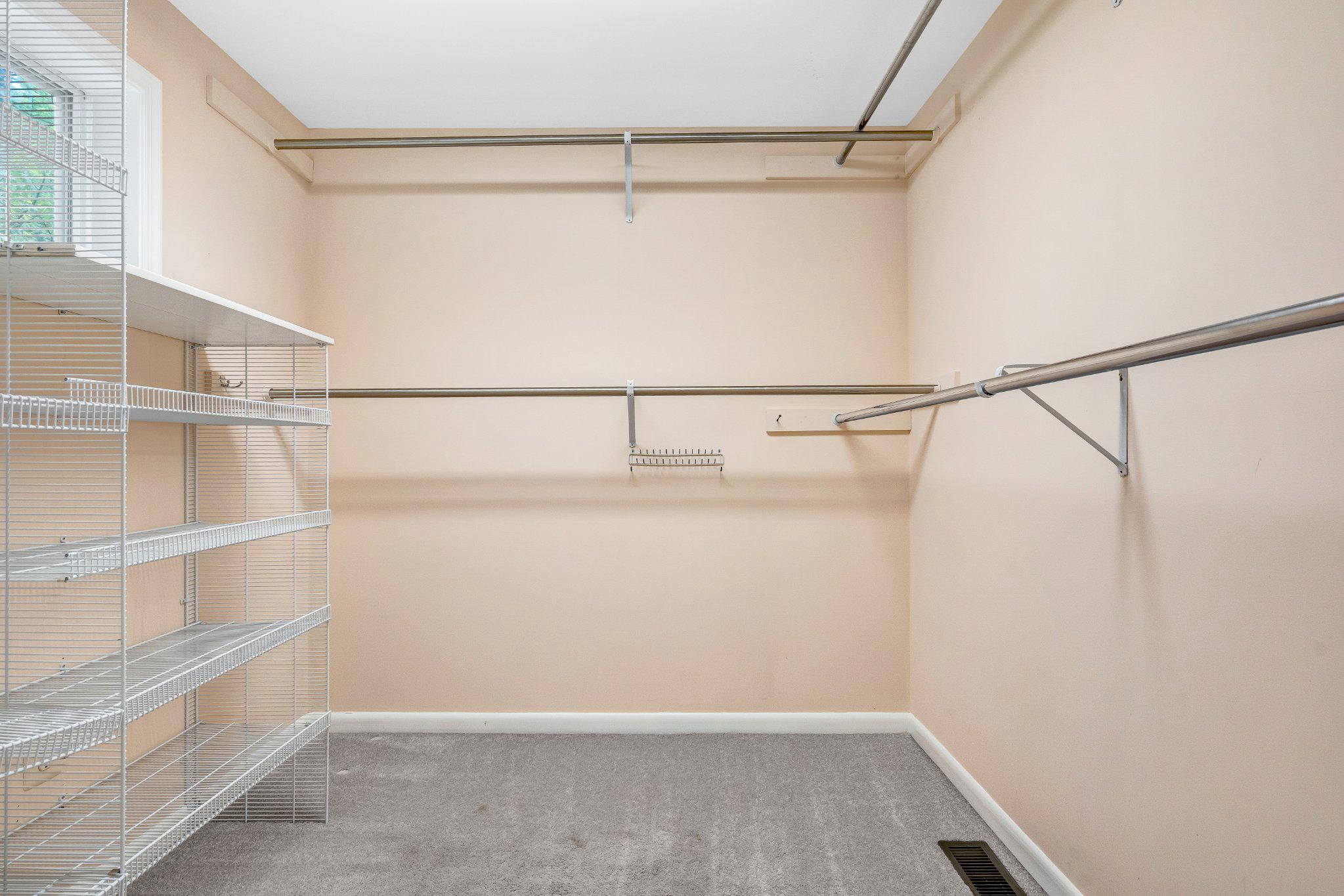 10910 Miller Road Oakton, VA 22124 - Photo 32 of 58 Spacious closet with versatile shelving.