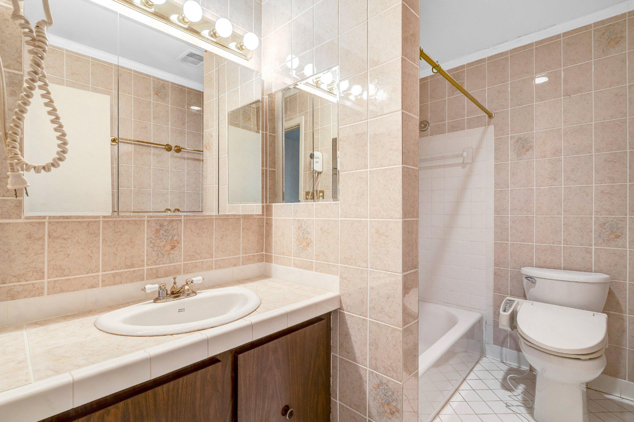 10910 Miller Road Oakton, VA 22124 - Photo 36 of 58 Charming tiled bathroom retreat.