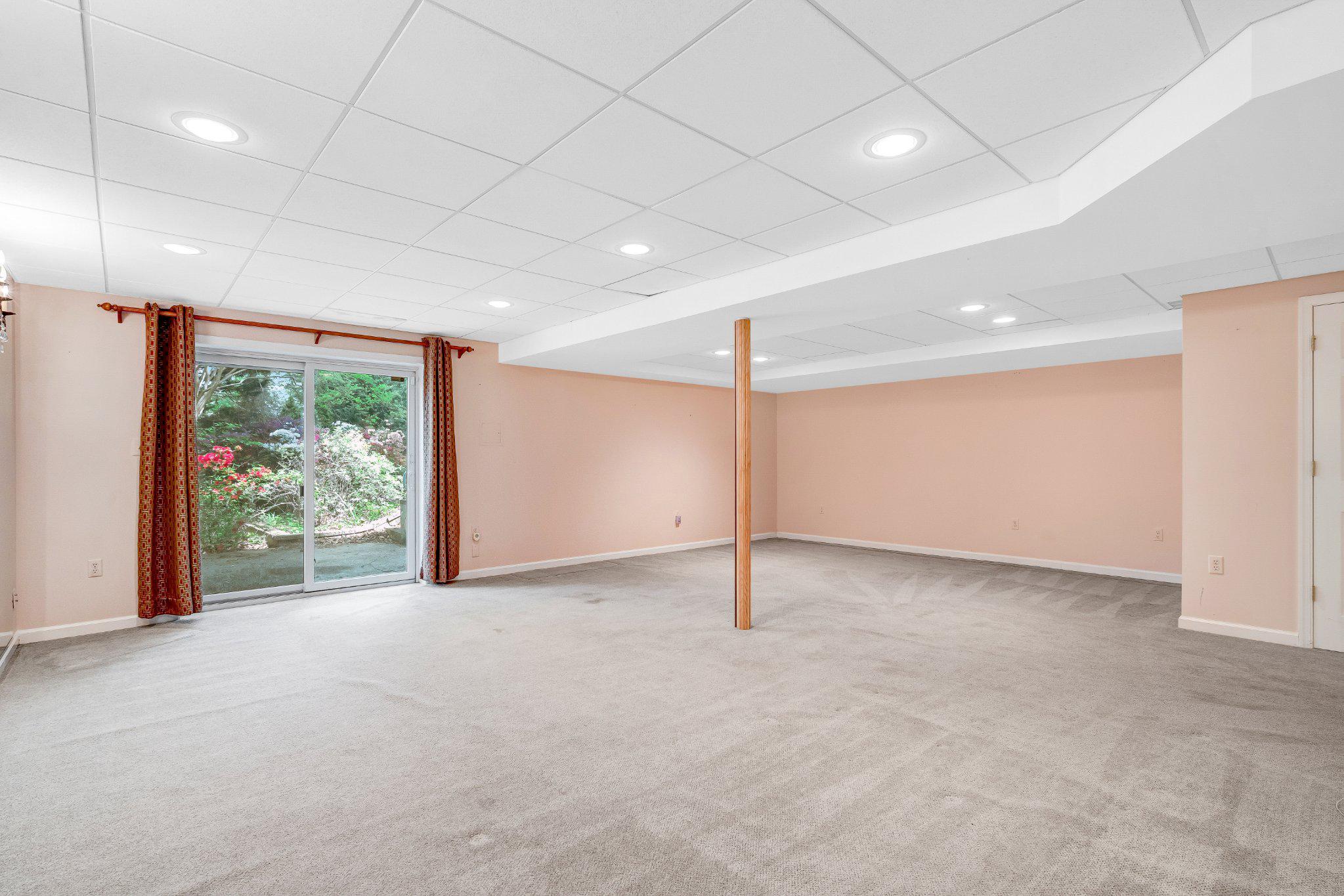 10910 Miller Road Oakton, VA 22124 - Photo 44 of 58 Spacious basement with serene views.