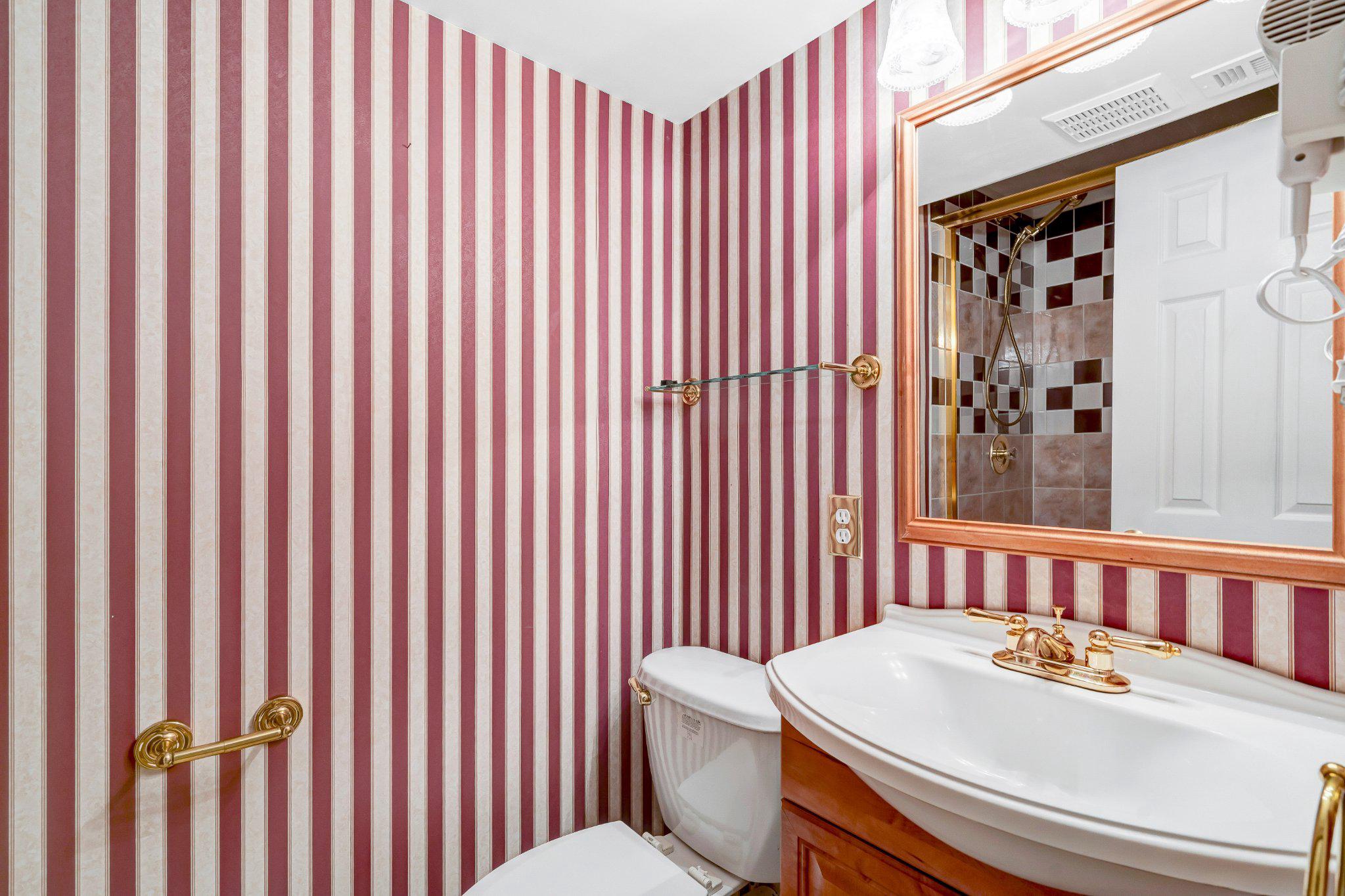 10910 Miller Road Oakton, VA 22124 - Photo 46 of 58 Charming striped bathroom retreat.