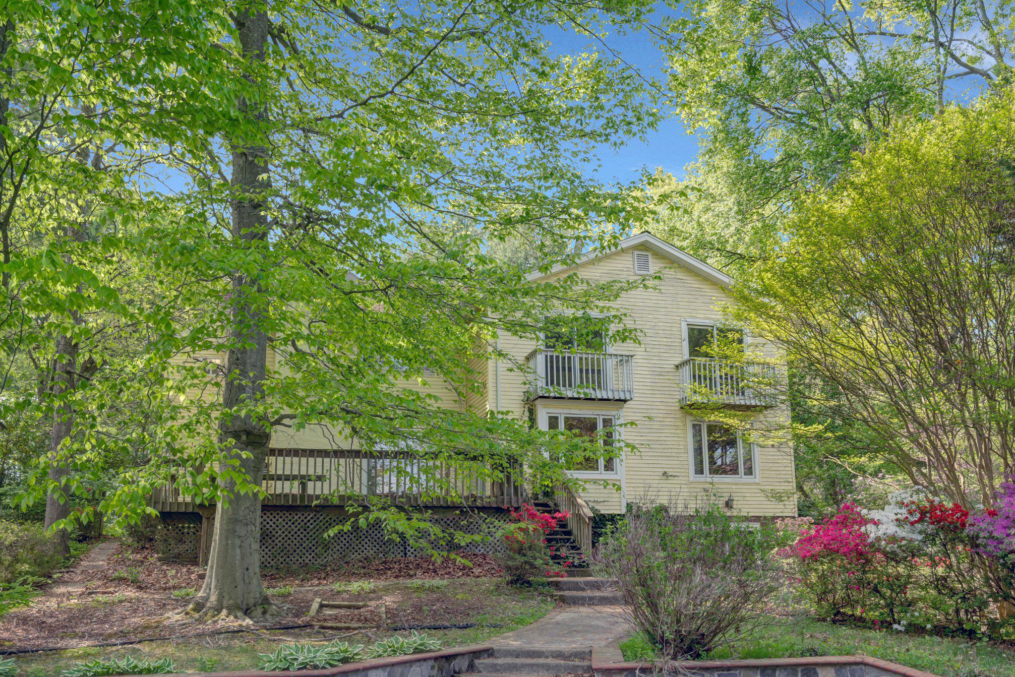 10910 Miller Road Oakton, VA 22124 - Photo 56 of 58 Charming home nestled in lush greenery.