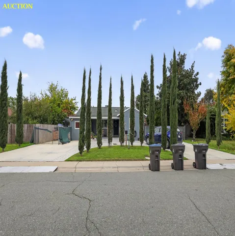 a view of a bench in front of a building
