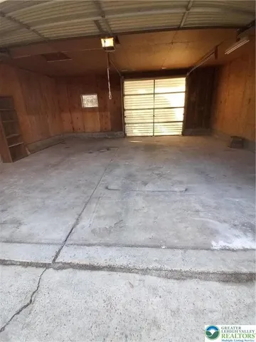 front view of a house with a dry yard