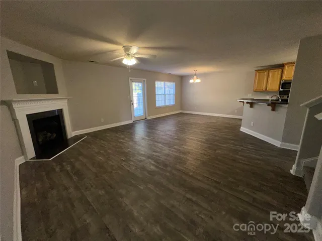 a view of a livingroom with a fireplace
