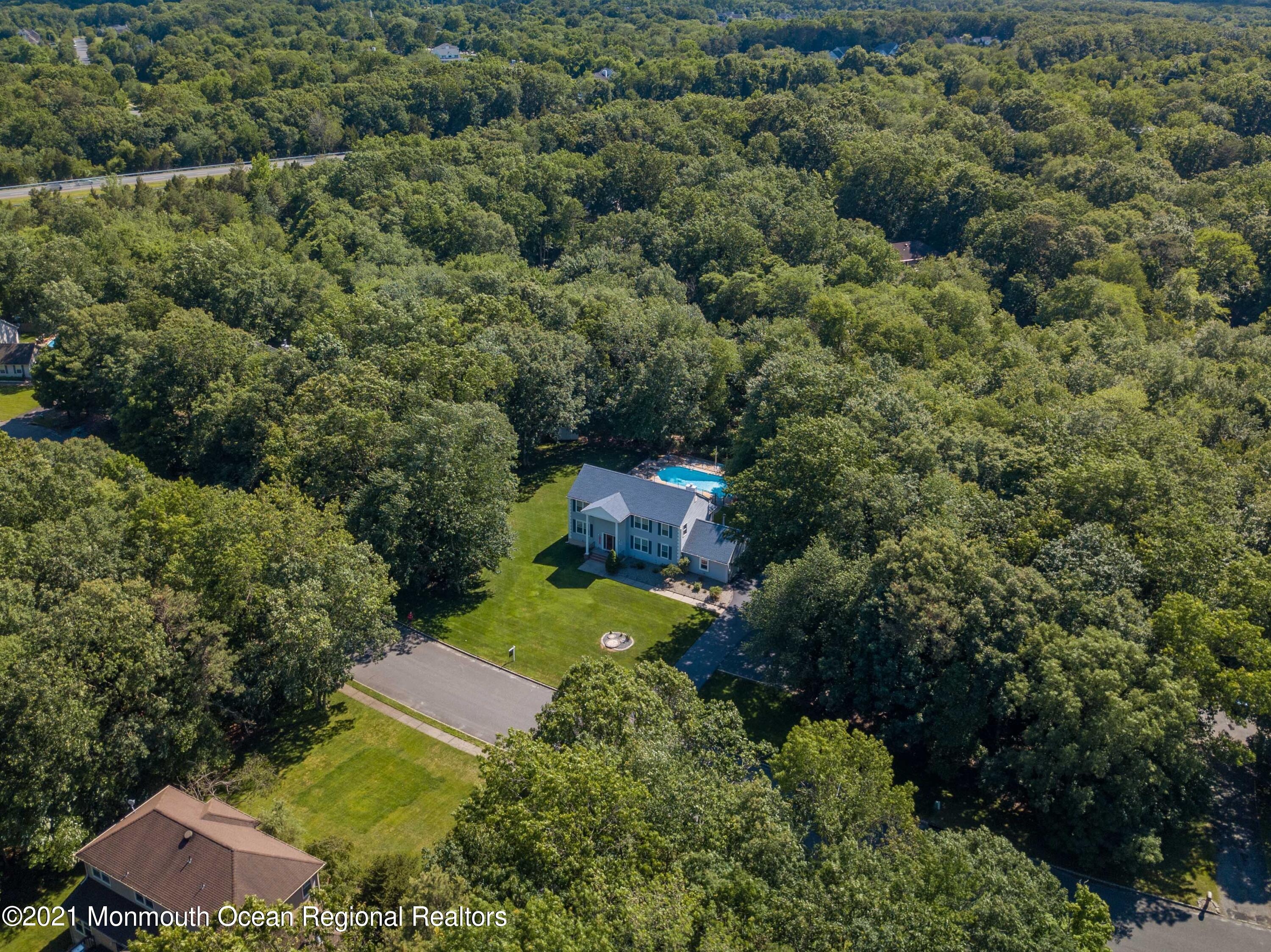 10 Rue Monet Jackson, NJ 08527 - Photo 23 of 30 an aerial view of a house with a yard