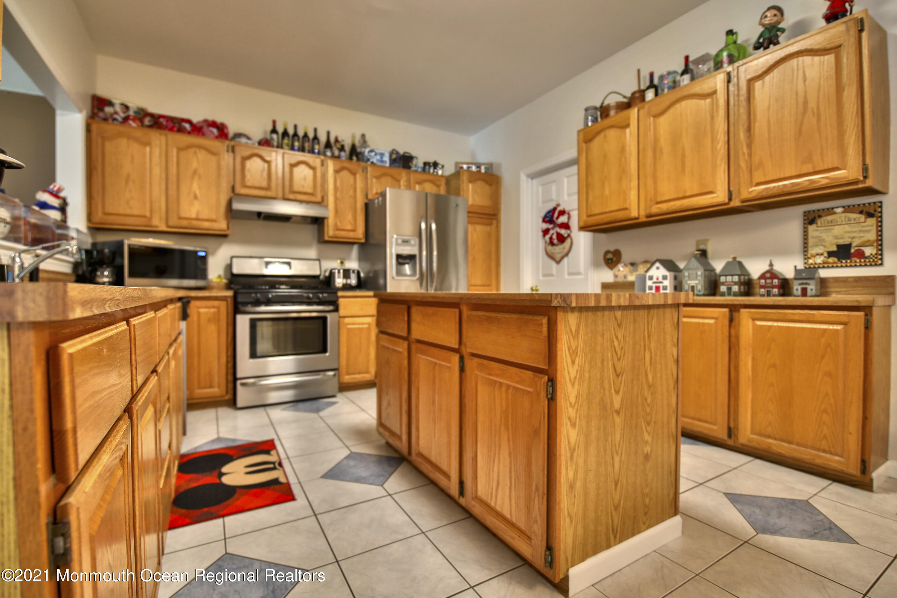 10 Rue Monet Jackson, NJ 08527 - Photo 7 of 30 a kitchen with stainless steel appliances granite countertop a refrigerator and stove