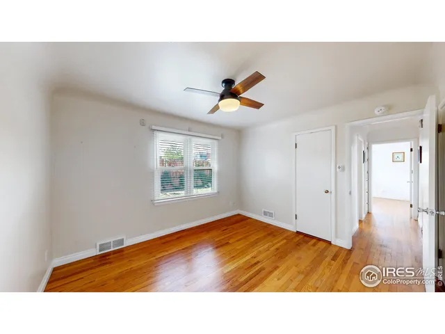 a bathroom with a sink and a view of cabinet