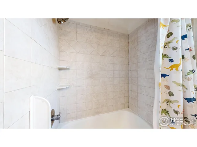 a bathroom with a sink and a shower