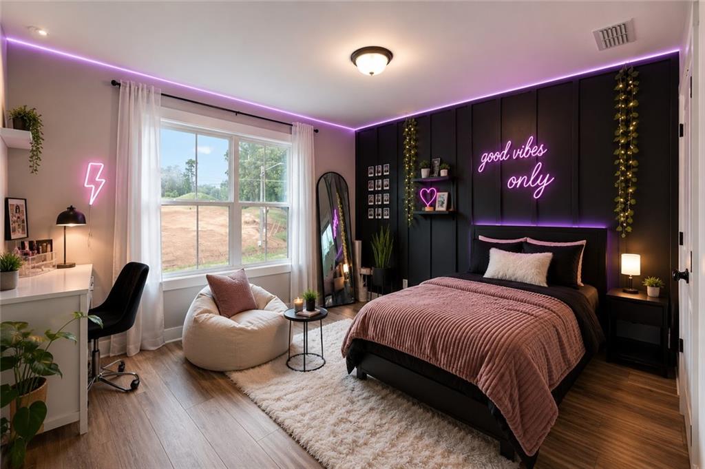 131 Old Alabama Road Southeast Emerson, GA 30137 - Photo 27 of 44 a spacious bedroom with a bed and large windows