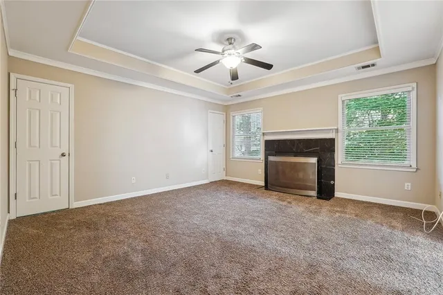 a spacious bathroom with a granite countertop tub sink and mirror