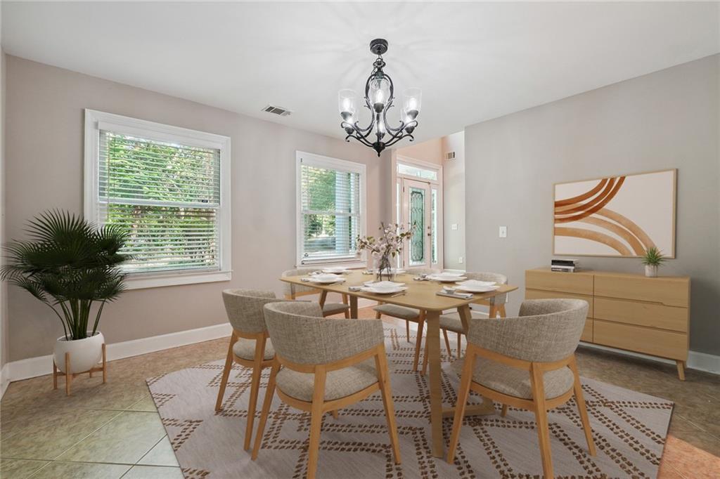 515 Spring Gate Lane Alpharetta, GA 30009 - Photo 8 of 36 a view of a dining room with furniture window and outside view